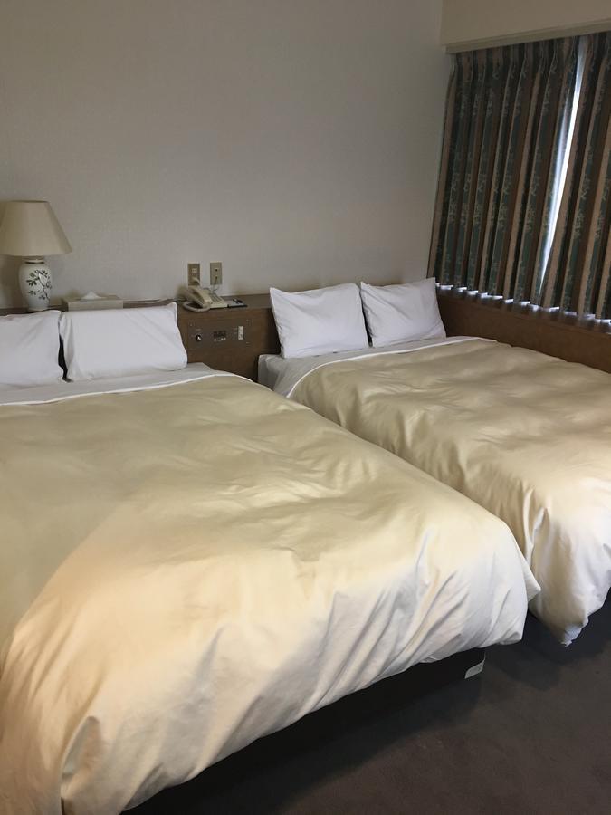 Hotel Crown Hills Matsuyama Macujama Szoba fotó